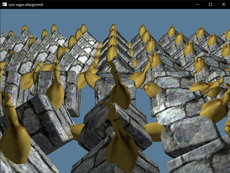 Screenshot of the native wgpu Rust app rendering a grid of 3D bananas and cubes in the same positions